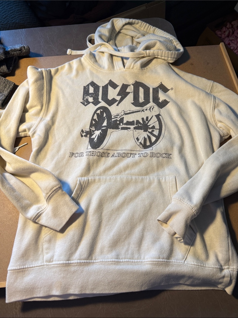 AC/DC Cream Zip-Up Hoodie with Black Cannon Graphic